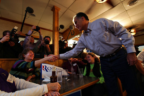 Mitt Romney at J's Homestyle Cooking in Cedar Falls, Iowa, on Thursday, where he addressed an overflow crowd and greeted supporters.