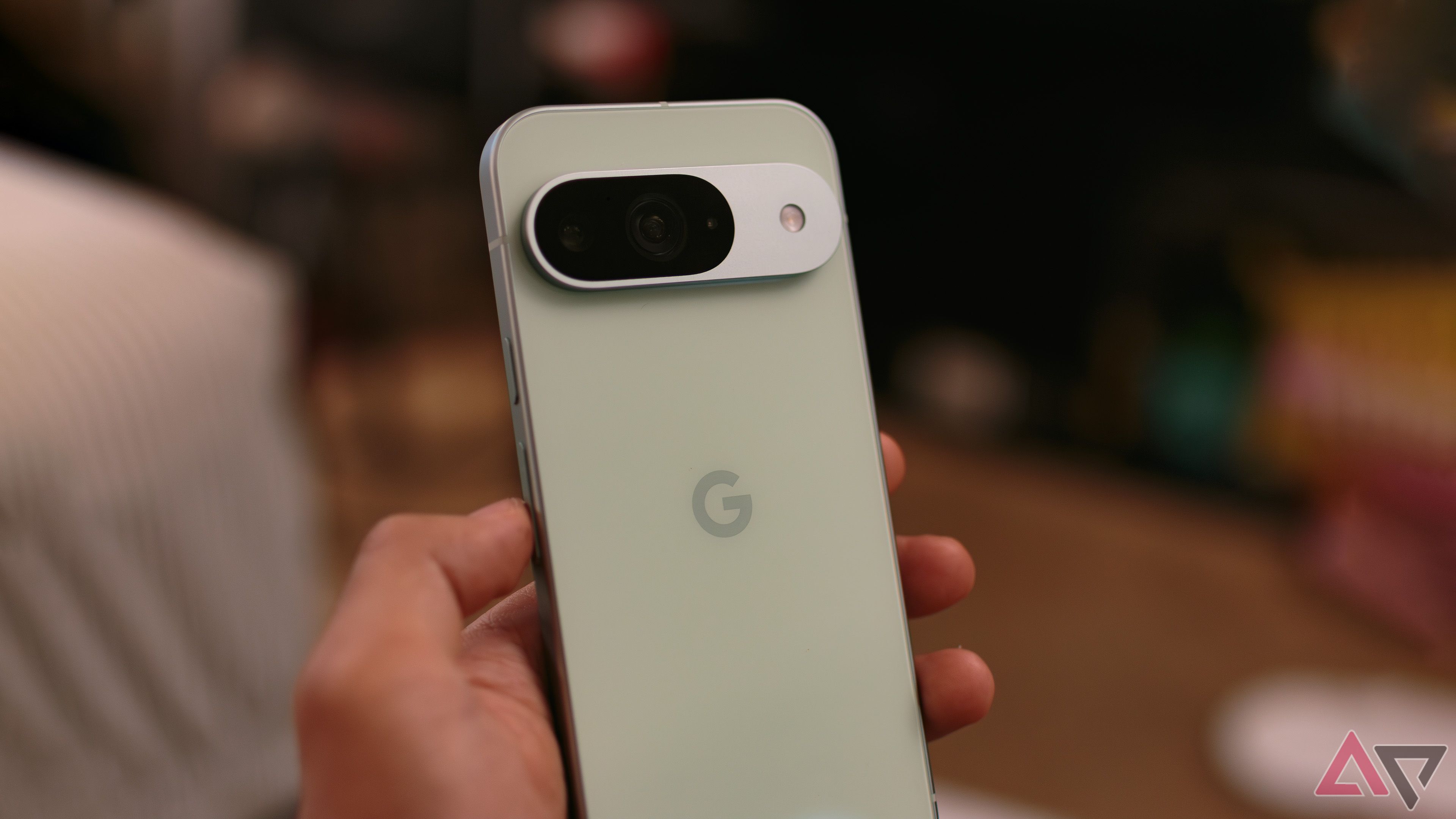 The back side of the Google Pixel 9 in green.