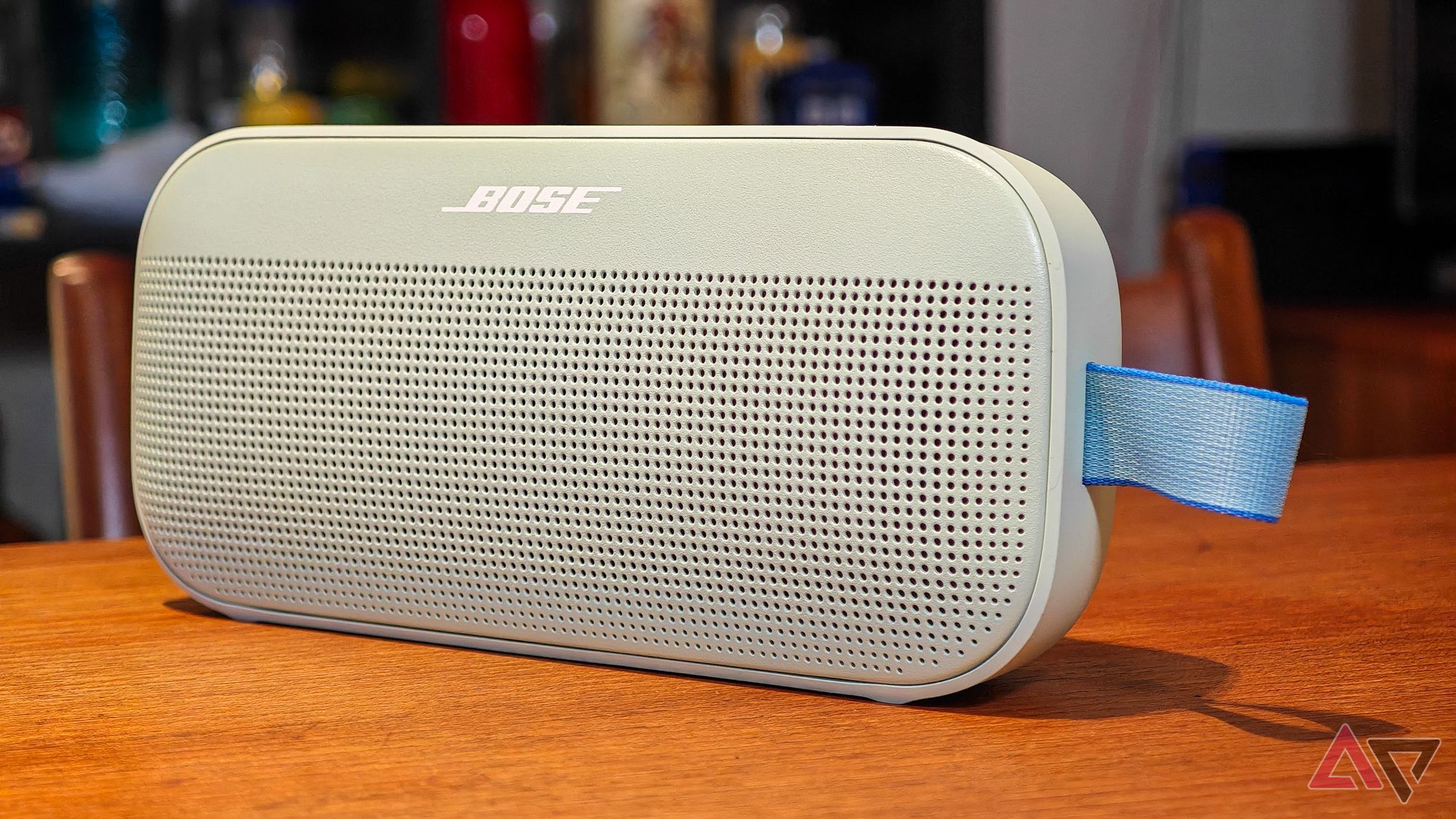 Bose SoundLink Flex 2 speaker on a wooden table