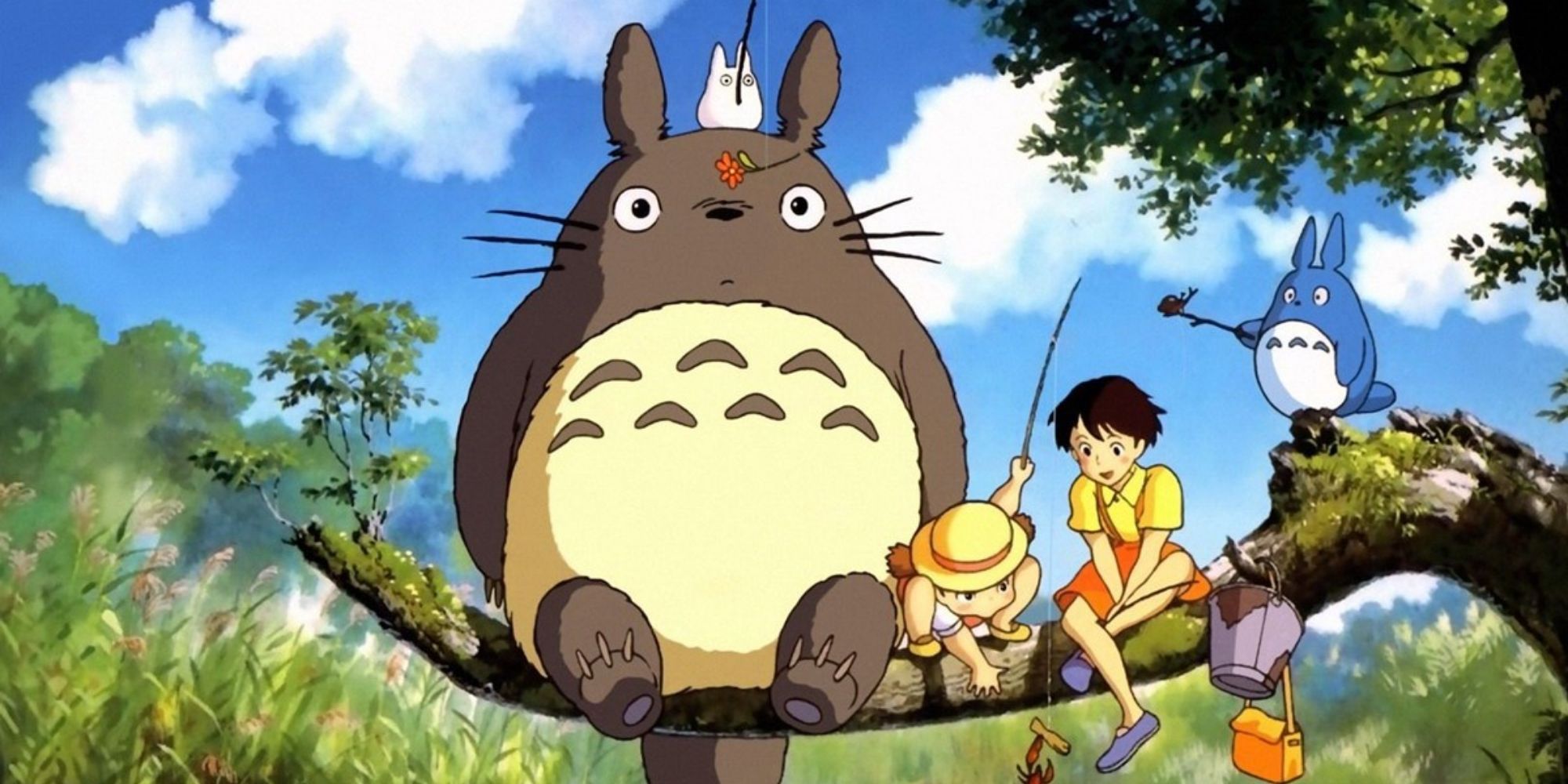 Satsuki and Mei sit in a tree with Totoro and other animals in My Neighbour Totoro