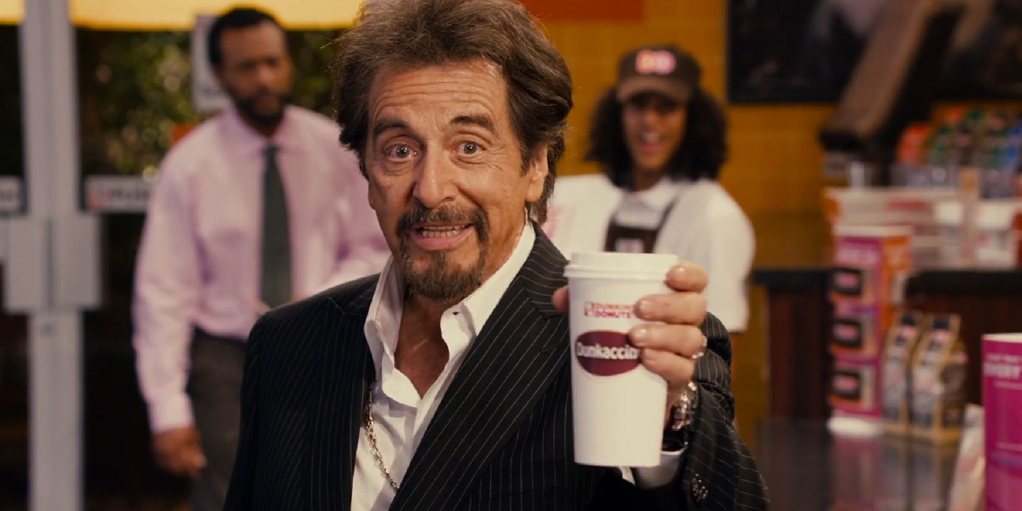 Al Pacino trying to smile the pain away during a scene in Jack and Jill