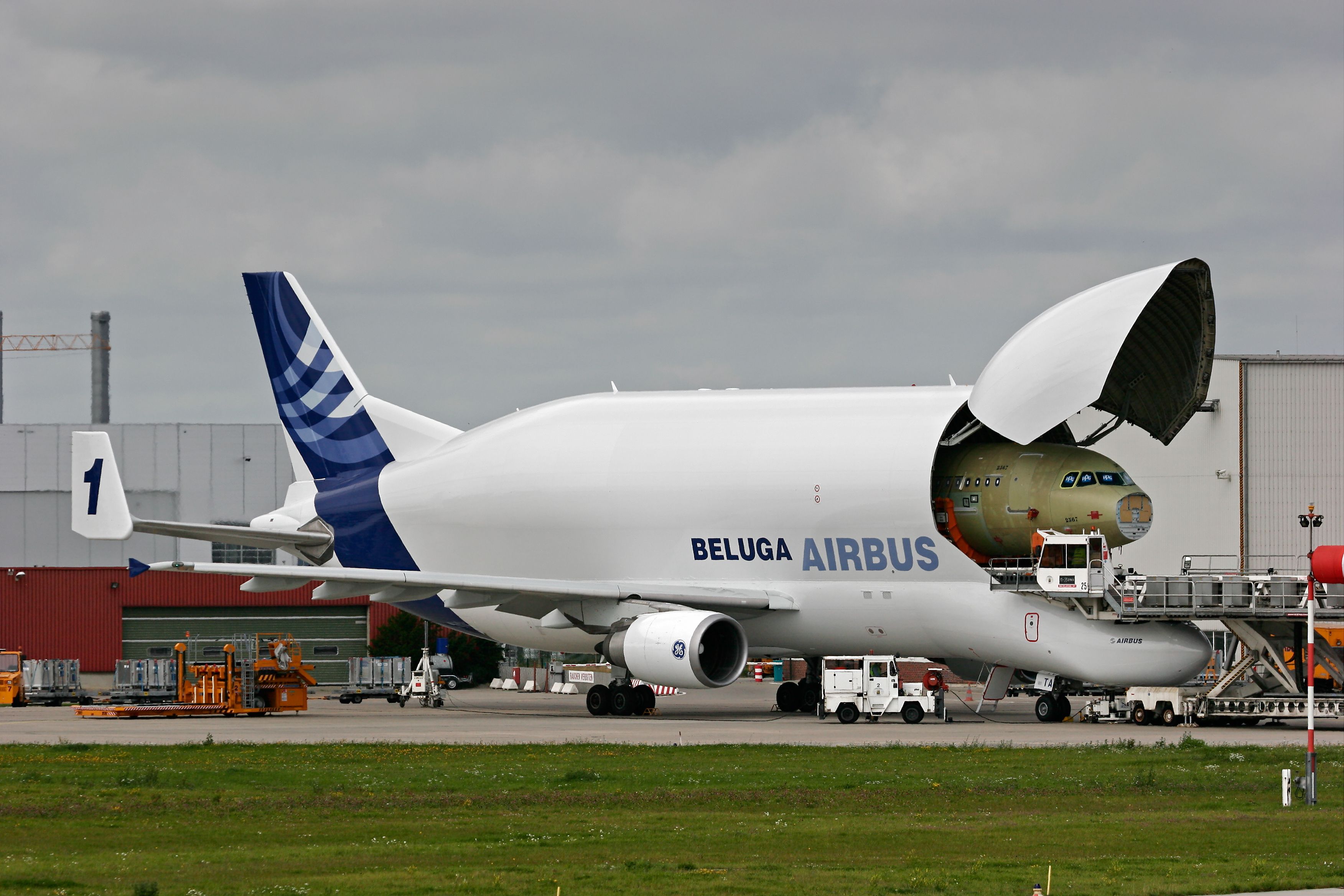 Airbus Beluga unloading A320 fuselage at Hamburg Finkenwerder XFW shutterstock_571504087