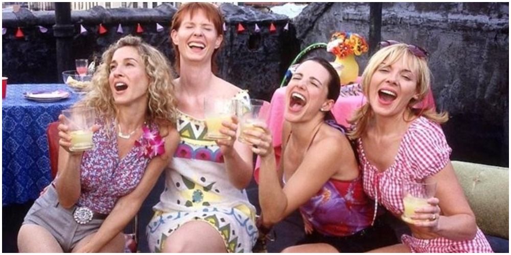 SATC - Girls sitting close together and laughing