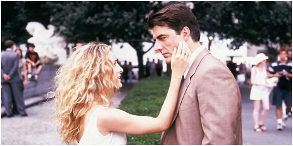 Carrie touching Big's face in park in SATC