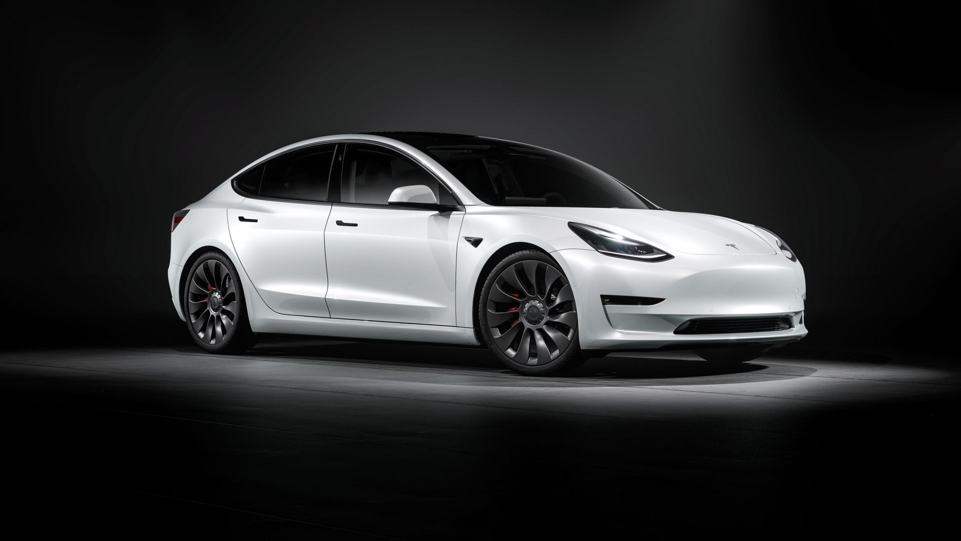 A white Tesla Model 3