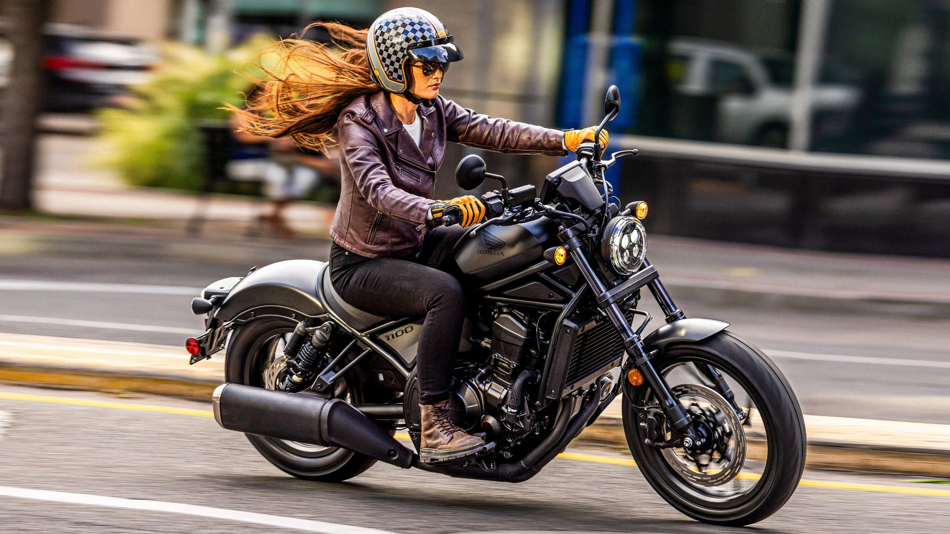 2025 Honda Rebel 1100 accelerating side profile view