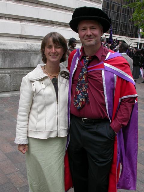 Me with Fiona, trying not a laugh at my nice red uniform