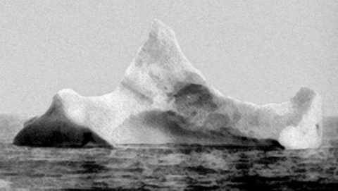  photo of the iceberg that sunk the Titanic, taken the morning of April 15, 1912 from board of the ship “Prinz Adalbert”, before knowing the Titanic had sunk. The smear of red paint along the base of the berg (bottom right) prompted the chief steward to take the picture.