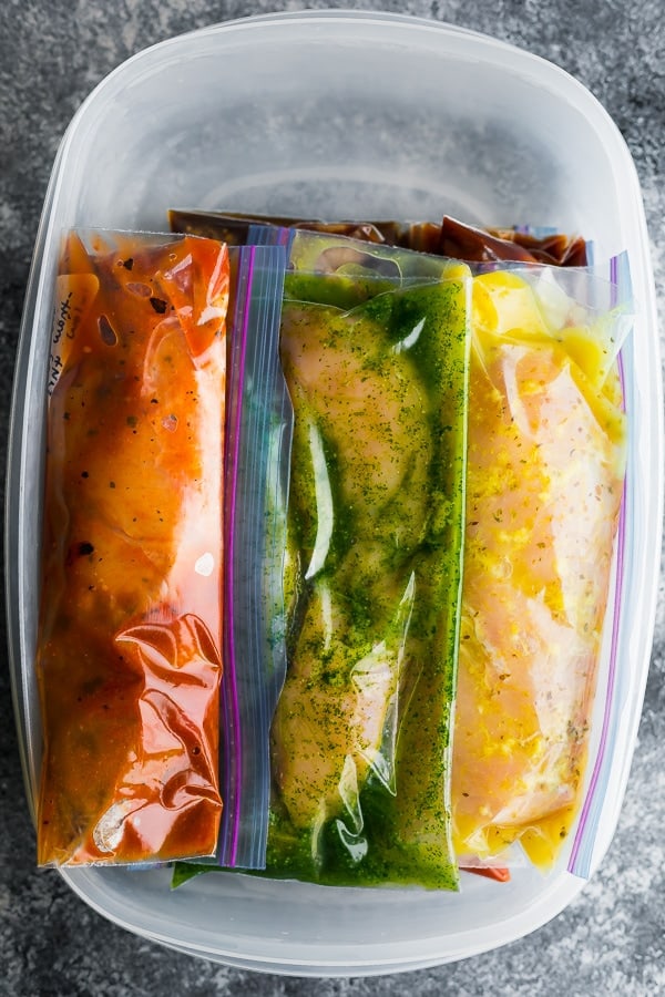 slow cooker chicken recipes in freezer bags in a plastic container