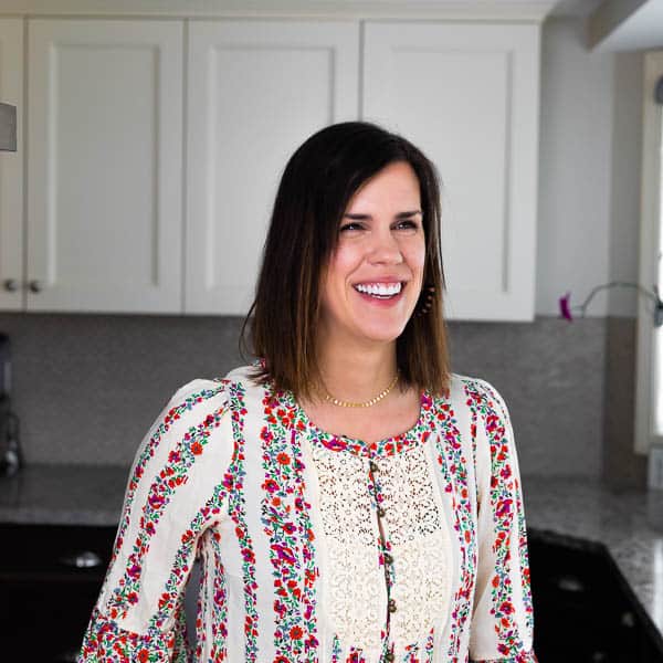 Denise Bustard standing in her kitchen