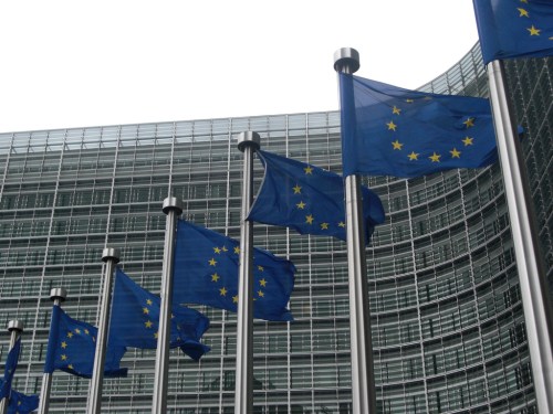 Multiple flags of Europe outside European Commission building