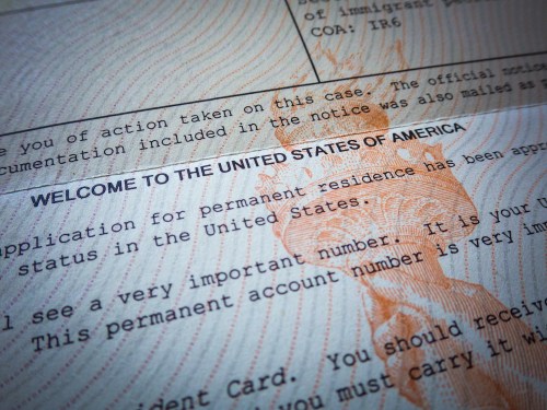 Detail of a Welcome to America Green Card acceptance letter.