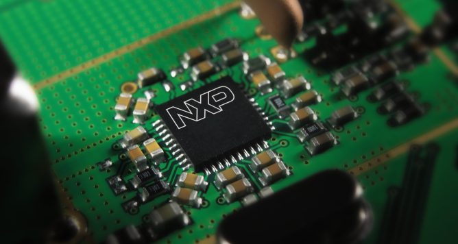 a photo of a green cicruit board made by NXP Semiconductors