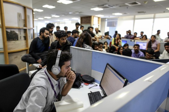 person working in a cubicle