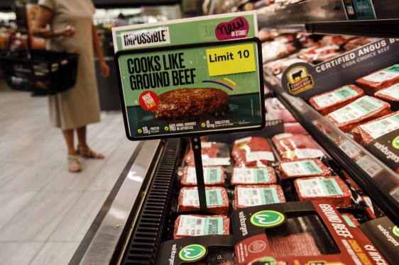 Impossible Foods Inc. signage is displayed during the company's grocery store product launch in Los Angeles, California, U.S., on Friday, Sept. 20, 2019. The Impossible Burger made its retail debut at 27 Gelson's Markets locations in Southern California before expanding its retail presence in the fourth quarter and in early 2020, the company said in a statement. Photographer: Patrick T. Fallon/Bloomberg