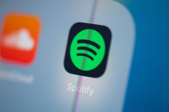 A photo of Spotify's app icon on iOS.