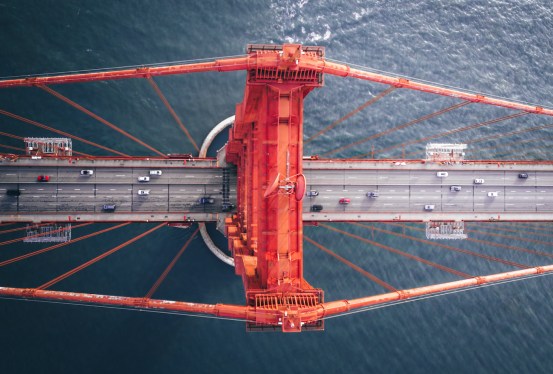 An aerial view of a tower of the Golden Gate Bridge