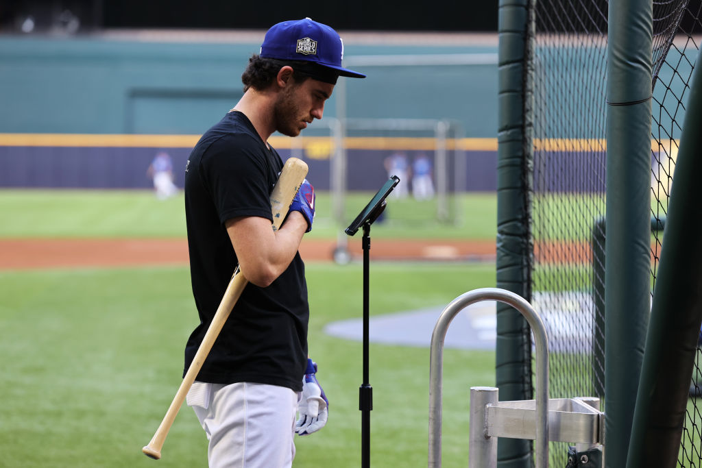 ARLINGTON, TX - OCTOBER 21: Cody Bellinger #35 of the Los Angeles Dodgers looks at an iPad during batting practice prior to Game 2 of the 2020 World Series between the Los Angeles Dodgers and the Tampa Bay Rays at Globe Life Field on Wednesday, October 21, 2020 in Arlington, Texas. (Photo by Alex Trautwig/MLB Photos via Getty Images)