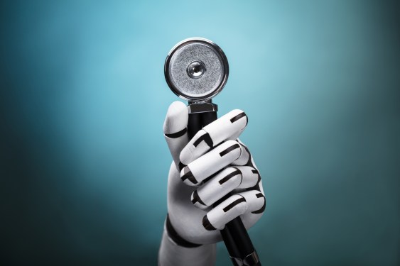 Close-up Of A Robot's Hand Holding Stethoscope; healthcare automation