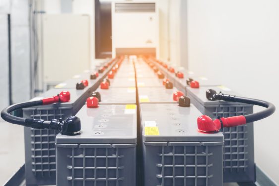 rows of lead-acid batteries for backup power