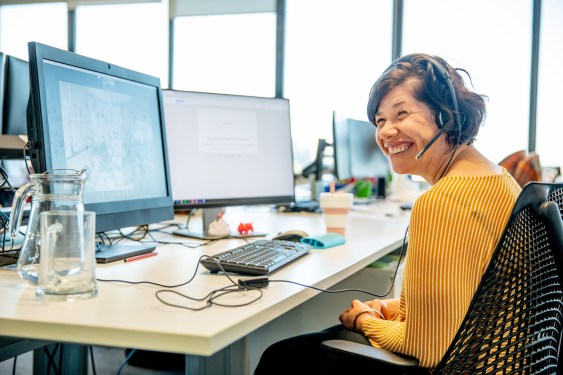 Women in an office environment working collaboratively - Repicturing Disability, used in a post about HeadsUp