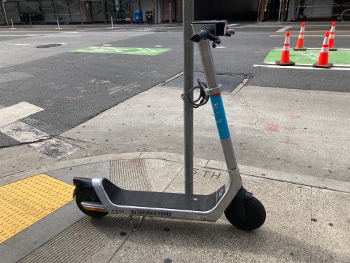 bird e-scooter on san francisco sidewalk