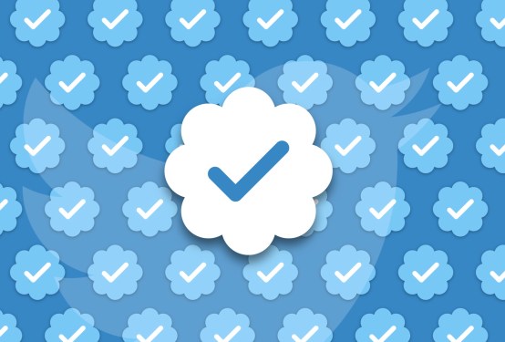 Twitter verified logos on a blue background