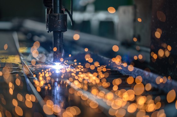 CNC machine cutting steel