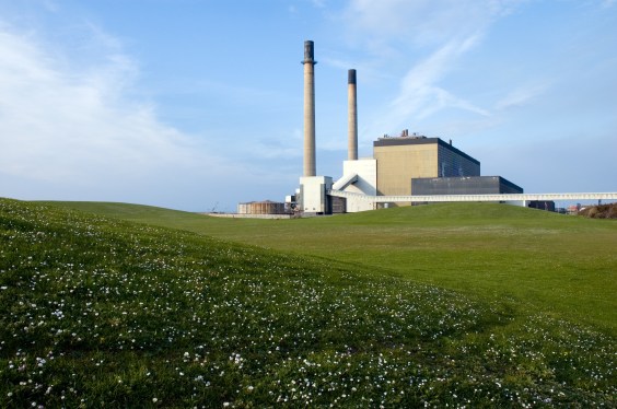 Big lawn with power station at the background