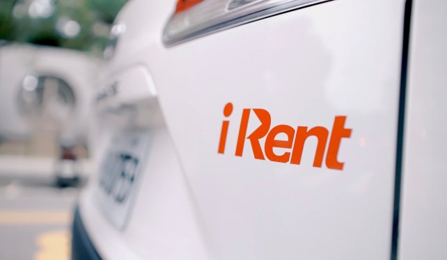 the rear of a car with the iRent logo to the right side of the license plate