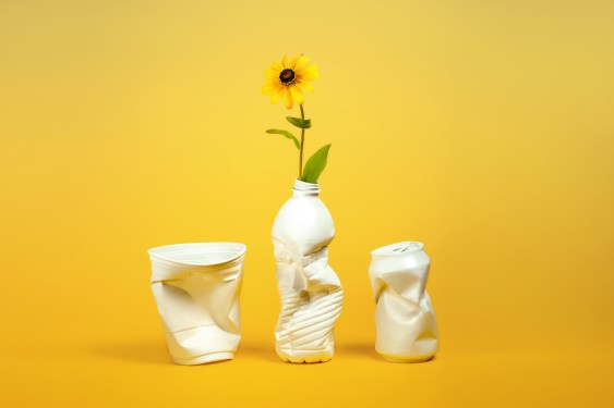 Plastic containers repurposed as vases