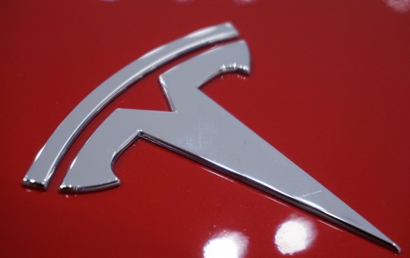 The logo of a Tesla car is seen in Hangzhou, Zhejiang province, China