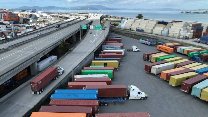 "In an aerial view, A truck moves along a freeway on March 31, 2023 in Oakland, California."