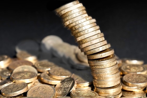 Stack of coins falling over