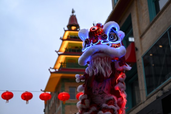 SAN FRANCISCO, CA, UNITED STATES - AUGUST 8: People with traditional costumes perform during the Chinatown Merchants Association ribbon cutting ceremony that was held to celebrate the restoration of the iconic Grant Avenue lanterns after enduring damage from last winter's storms as the lanterns have been replaced, in San Francisco, California, United States on August 8, 2023. (Photo by Tayfun Coskun/Anadolu Agency via Getty Images)