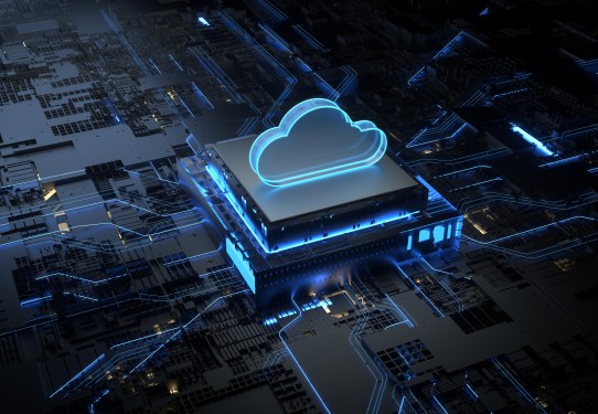 Cloud on top of a three dimensional chip sitting on a motherboard.