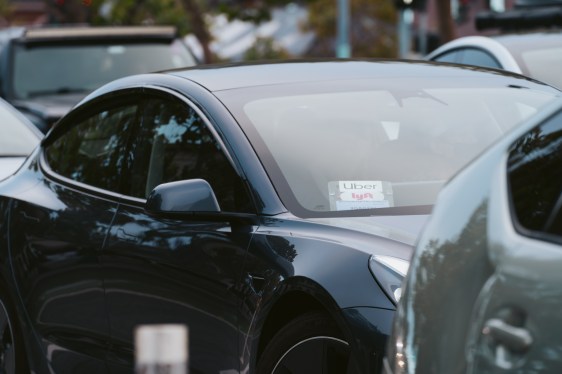 Uber and Lyft signage on a vehicle in San Francisco