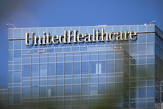 UnitedHealthcare (UHC) health insurance company signage is displayed on an office building in Phoenix, Arizona