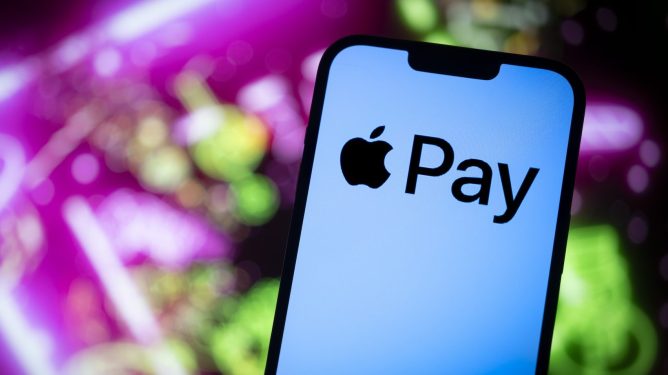 The Apple Pay logo is seen in this photo illustration on 23 November, 2023