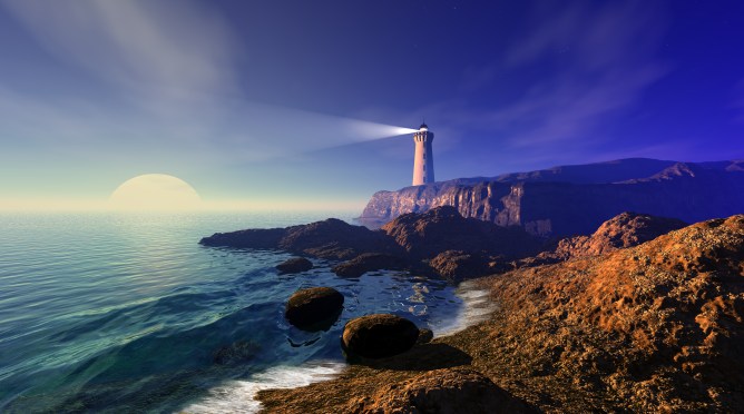 Lighthouse on cliff at the edge of an island.