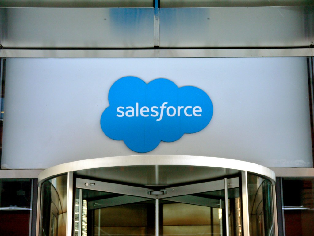 Close-up view of the logo at the entrance to the Salesforce office located at 111 West Illinois Street in Chicago, Illinois, January 2019.
