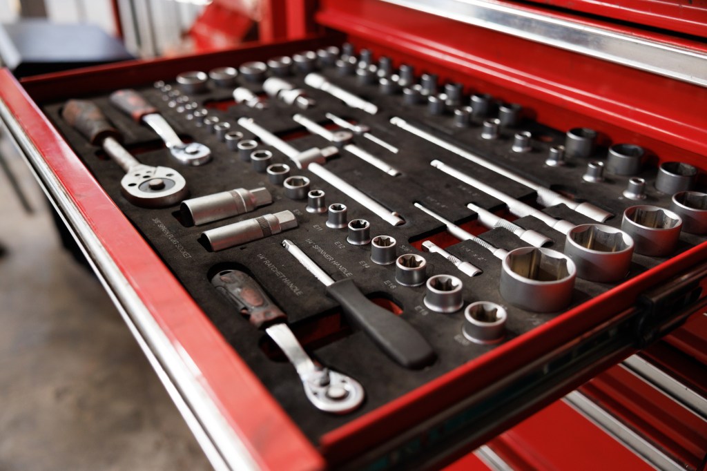 toolbox tray pulled out showing socket wrenches