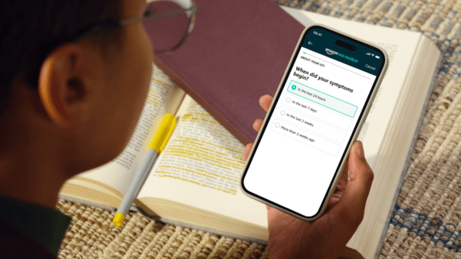Amazon telehealth; person looking at smartphone screen