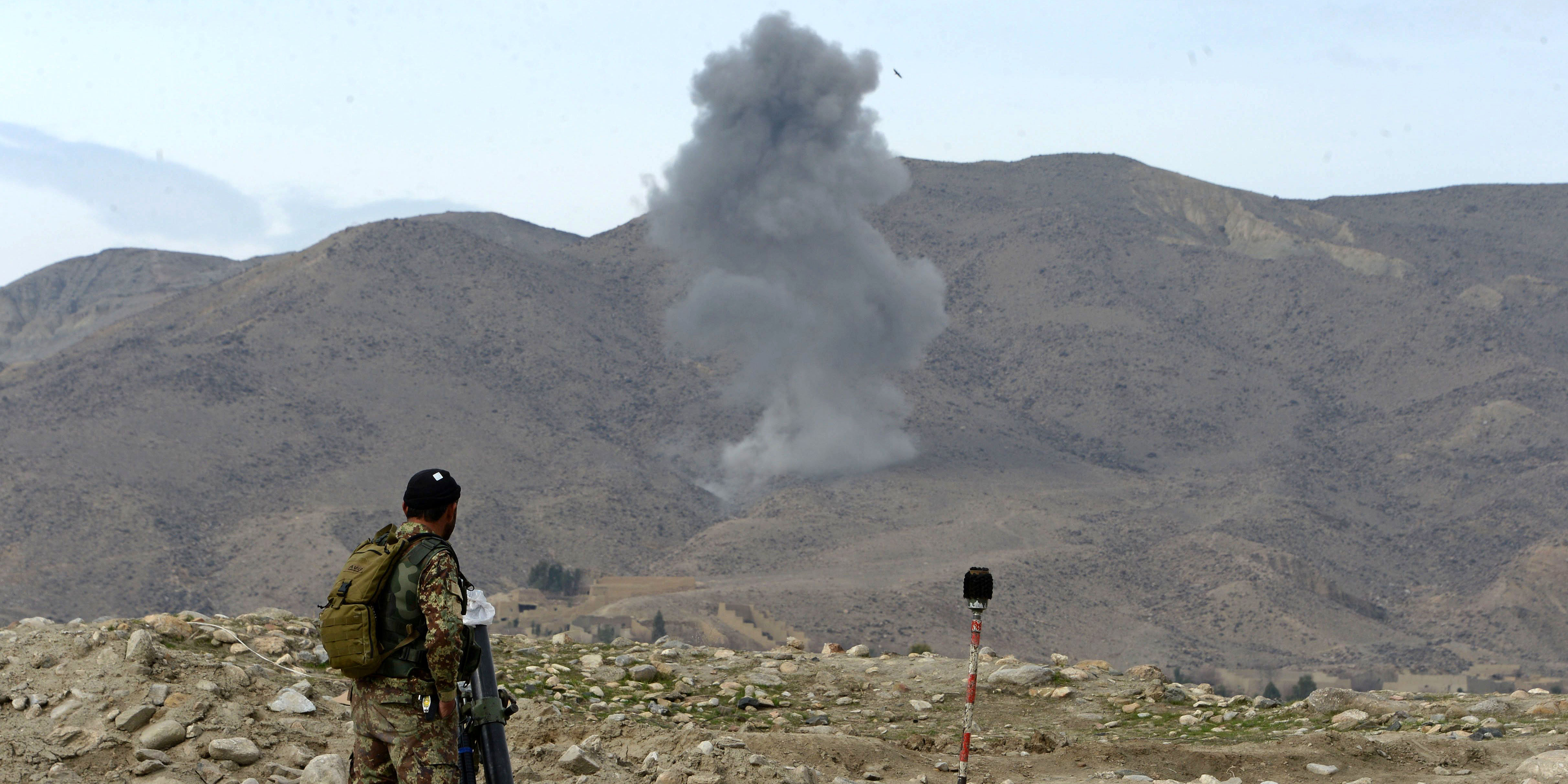 Smoke rises after an air strike by US aircraft on positions during an ongoing an operation against Islamic State (IS) militants in Kot district of Nangarhar province on February 16, 2017. Afghan National Army (ANA) and international air forces have launched a joint military operation against Islamic State (IS) militants, after houses of locals were torches and several people were killed by IS fighters in the area, so far in the operation at least 52 armed insurgents have been killed and 18 others wounded, security force officials said. / AFP / NOORULLAH SHIRZADA (Photo credit should read NOORULLAH SHIRZADA/AFP/Getty Images)