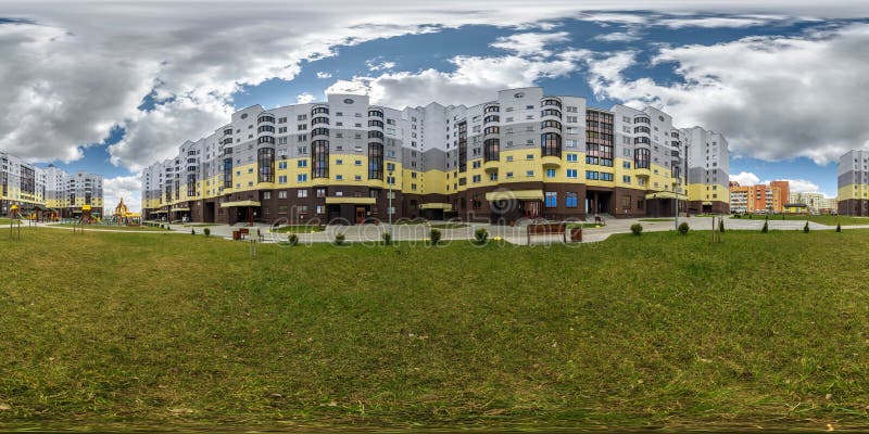 360 hdri panorama near playground in middle of modern multi-storey multi-apartment residential complex of urban development in stock images