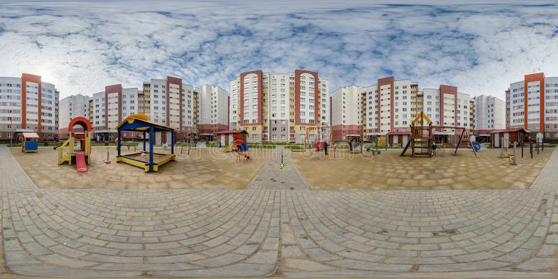 360 hdri panorama near playground in middle of modern multi-storey residential complex of urban development in equirectangular royalty free stock photography
