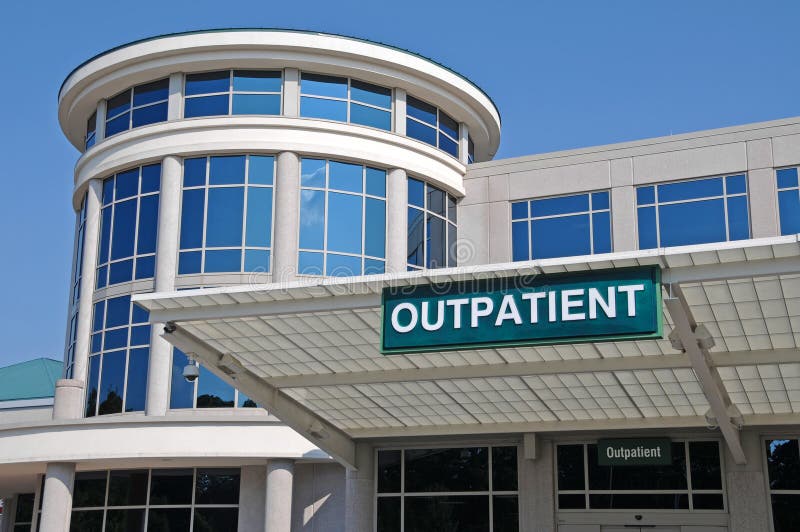 Outpatient Sign over a Hospital Outpatient Services Entrance. Outpatient Sign over a Hospital Outpatient Services Entrance