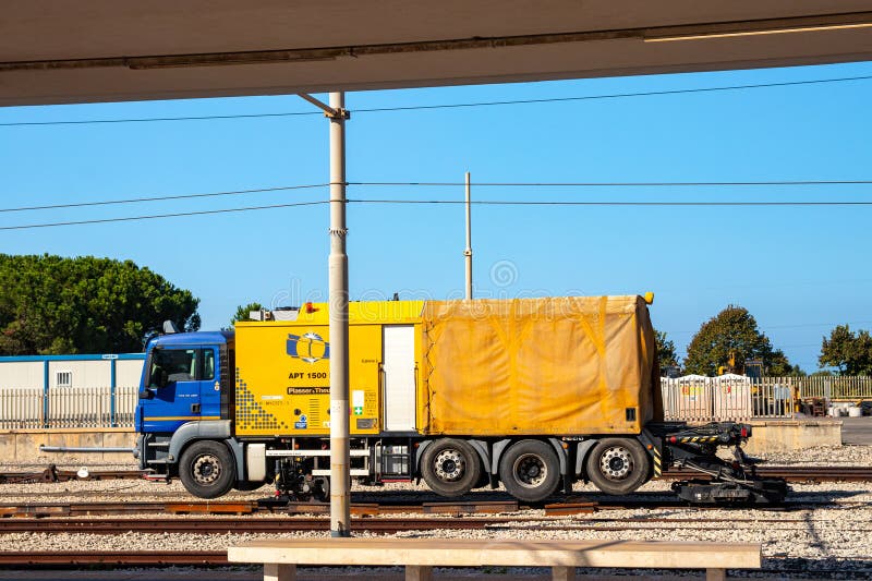 MILAZZO, SICILY, Italy - 03 October 2023. Mobile rail welding robot APT 1500 RL is driven over the road to the construction site royalty free stock photo