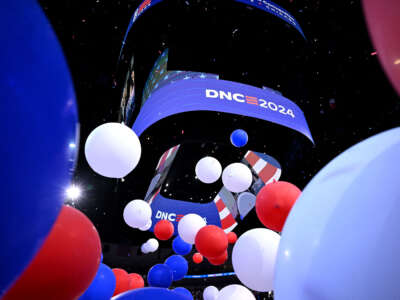 Balloons fall at the end of the fourth and last day of the Democratic National Convention (DNC) at the United Center in Chicago, Illinois, on August 22, 2024.