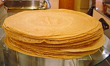 tall stack of cooked crepes